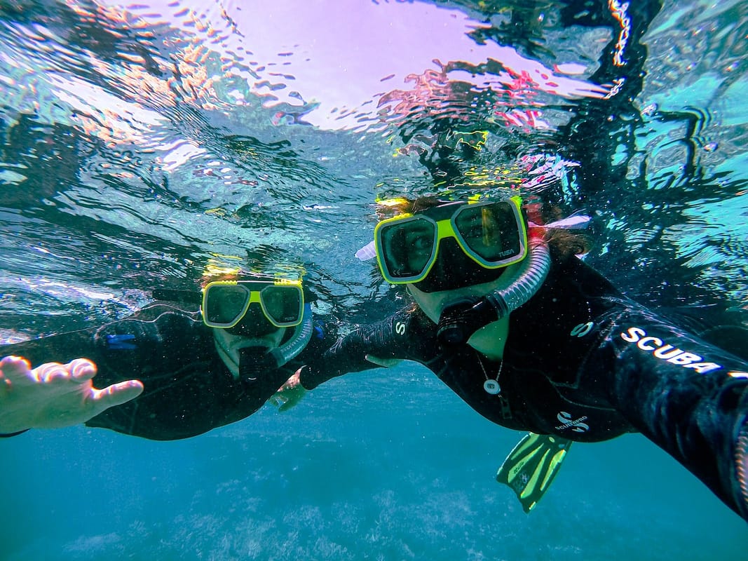 snorkeling couple